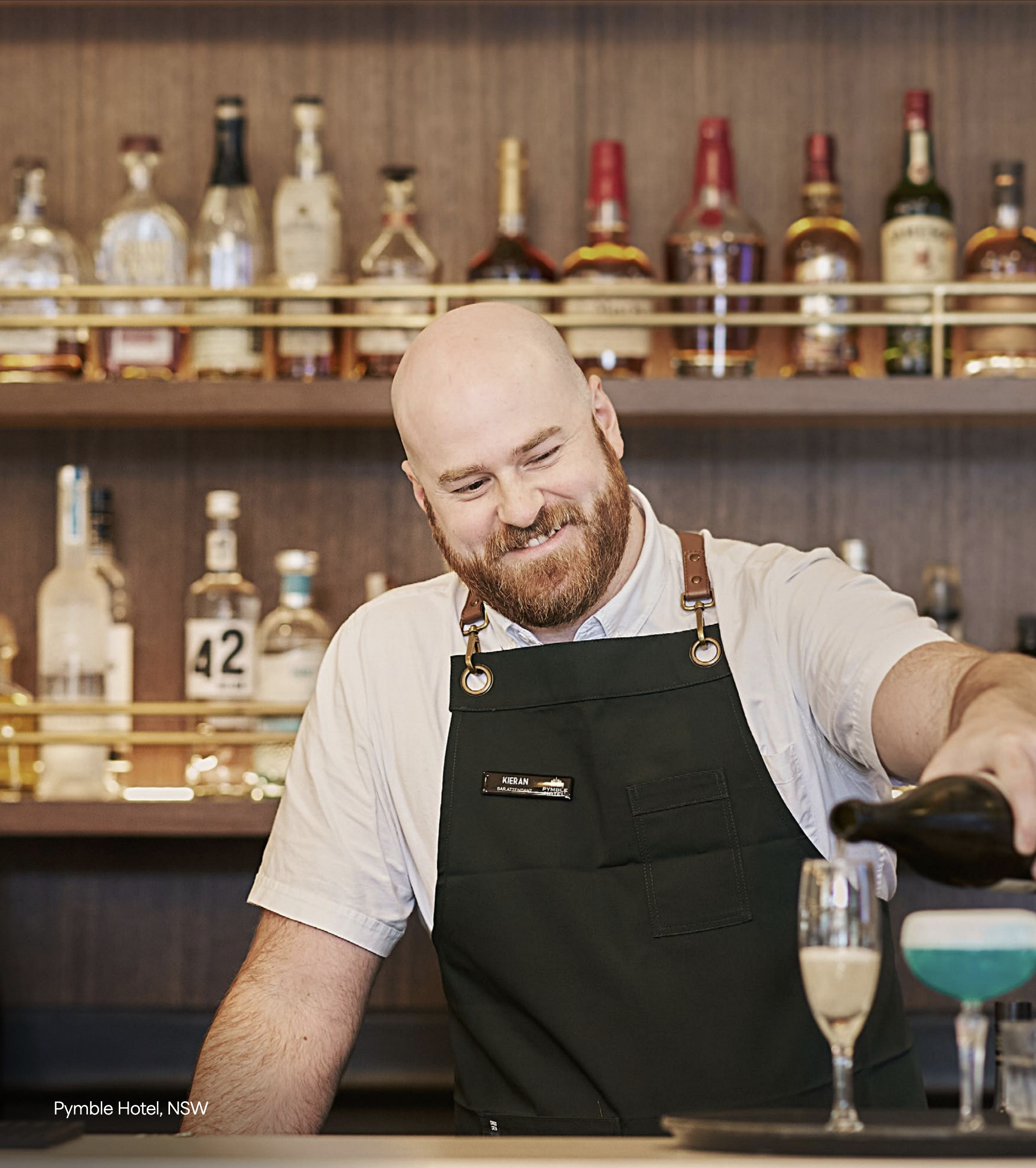 Bartender at Pymble Hotel preparing a drink